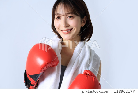 Image of a female boxer after practice Image of a female boxer after practice 128902177