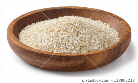 一張白色背景上放著一堆白芝麻的木碗的照片 一張白色背景上放著一堆白芝麻的木碗的照片 128902218