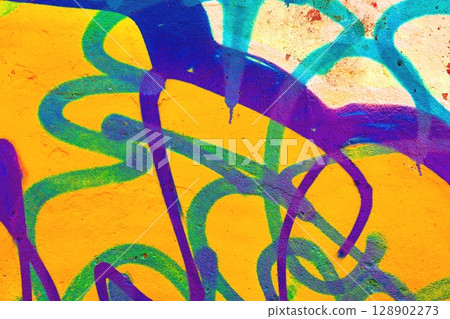 Vibrant Graffiti Swirls on Bold Yellow Wall for Funky 90s Urban Art Vibrant Graffiti Swirls on Bold Yellow Wall for Funky 90s Urban Art 128902273