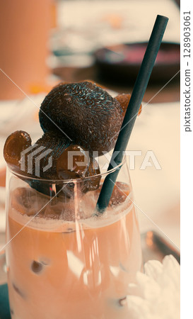 Creative Chocolate Bear in a Glass of Cocktail Creative Chocolate Bear in a Glass of Cocktail 128903061