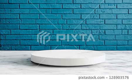 Empty round pedestal for montage products on marble countertop against textured blue brick wall. Concept of product display, space for presentation, branding and advertising products Empty round pedestal for montage products on marble countertop against textured blue brick wall. Concept of product display, space for presentation, branding and advertising products 128903576