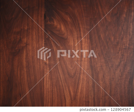 Texture of toned black walnut wood with oil finish 128904567