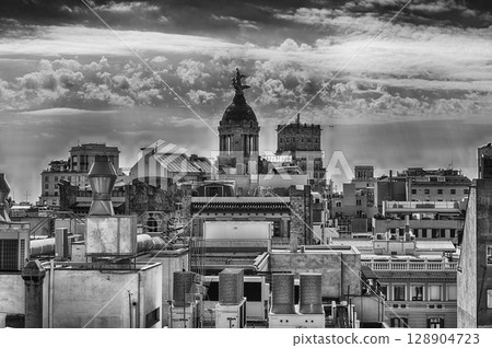 Aerial view over the rooftops of central Barcelona, Catalonia, Spain 128904723