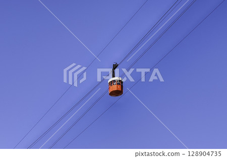 Red wagon of the cablecar in Barcelona, Catalonia, Spain Red wagon of the cablecar in Barcelona, Catalonia, Spain 128904735