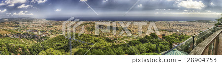 Panoramic view from Tibidabo mountain over Barcelona, Catalonia, Spain 128904753