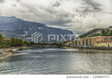 Scenic view over the Adda river in central Lecco, Italy Scenic view over the Adda river in central Lecco, Italy 128904757