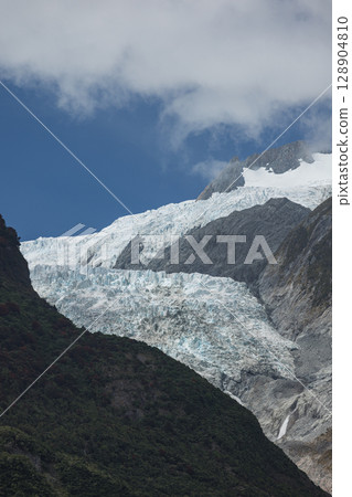Franz Josef Glacier in Westland National Park, West Coast, New Zealand Franz Josef Glacier in Westland National Park, West Coast, New Zealand 128904810