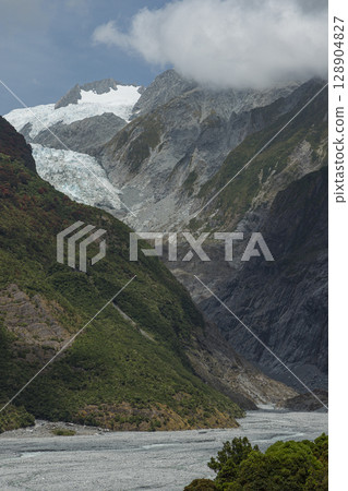 Franz Josef Glacier as seen from Sentinel Rock in Westland National Park, New Zealand 128904827
