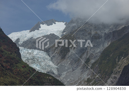 Franz Josef Glacier as seen from Sentinel Rock in Westland National Park, New Zealand 128904830