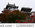 Castle tower surrounded by autumn leaves 128904865