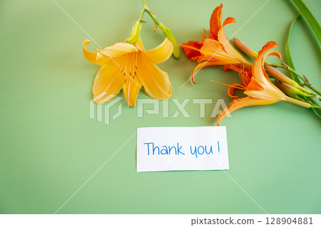 Congratulatory card with a bouquet of bright lilies for Mother's Day 128904881