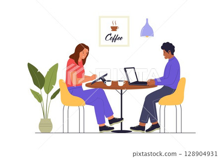 Team Coworking at Coffee Shop Table with Laptops 128904931