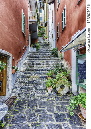 Scenic alley in Varenna town, Lake Como, Italy 128905086