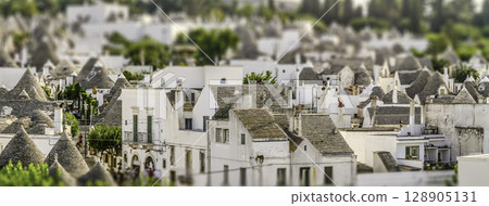 Scenic view of Alberobello and trulli, Italy. Tilt-shift effect applied Scenic view of Alberobello and trulli, Italy. Tilt-shift effect applied 128905131