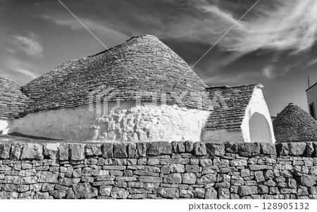 Typical trulli buildings in Alberobello, Apulia, Italy Typical trulli buildings in Alberobello, Apulia, Italy 128905132