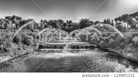 Scenic fountain in the EUR district of Rome, Italy Scenic fountain in the EUR district of Rome, Italy 128905152