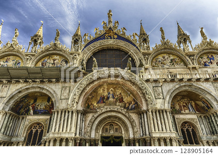 Facade of St Mark's Basilica, cathedral church of Venice, Italy 128905164