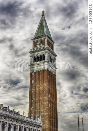 St Mark's Campanile, the most recognizable symbols of Venice, Italy 128905168
