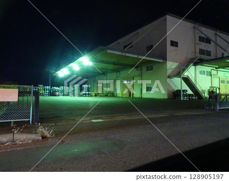 Logistics warehouse at night 128905197