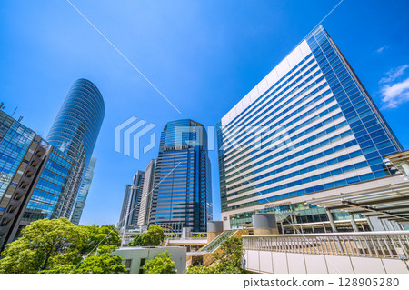 Tokyo cityscape in Japan, overlooking Shinagawa Station and office buildings, July 26th 128905280