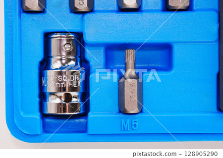 part of A set of single-sided chrome steel bits in a blue plastic box  128905290