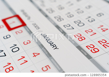 Sheets of a tear-off calendar for 2025 with a red frame. Sheets of a tear-off calendar for 2025 with a red frame. 128905354