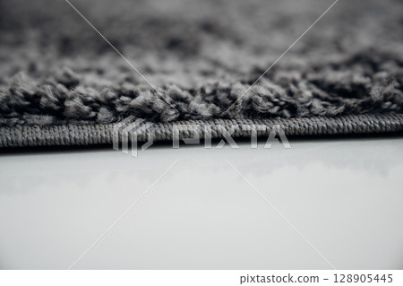 close-up. dark gray Interior pile carpet made of polypropylene.  128905445