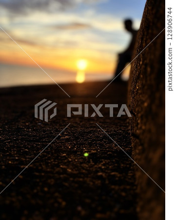 Sunset over the sea Sunset over the sea 128906744