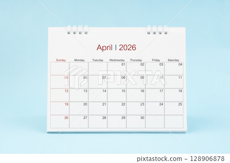 April 2026, Monthly desk calendar for 2026 year on Blue color background. 128906878
