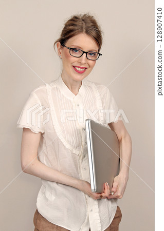 Computer under arm Computer under arm 128907410