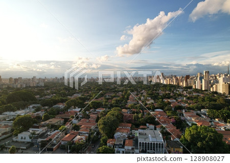 Coastal view of Sao Paulo showing urban landscape and greenery at sunset 128908027
