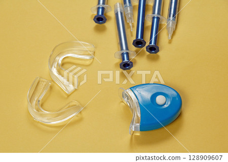 Led lamp with syringes for teeth whitening 128909607
