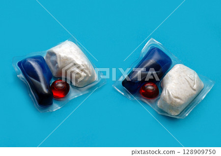 Blue pods for machine washing Blue pods for machine washing 128909750