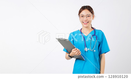 Smiling Asian woman doctor, healthcare medical worker in uniform with stethoscope, glasses holds clipboard as friendly nurse, suitable for clinic ads, cheerful female nurse, isolated white background Smiling Asian woman doctor, healthcare medical worker in uniform with stethoscope, glasses holds clipboard as friendly nurse, suitable for clinic ads, cheerful female nurse, isolated white background 128910120