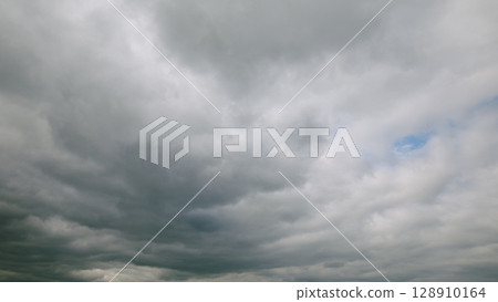 A Dramatic and Overcast Landscape That Lays Beneath a Cloudy Sky Which Captivates the Eye 128910164