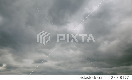 Gloomy Sky with Overcast Clouds A Stunning Nature Landscape Featuring Dark and Dramatic Skies Gloomy Sky with Overcast Clouds A Stunning Nature Landscape Featuring Dark and Dramatic Skies 128910177