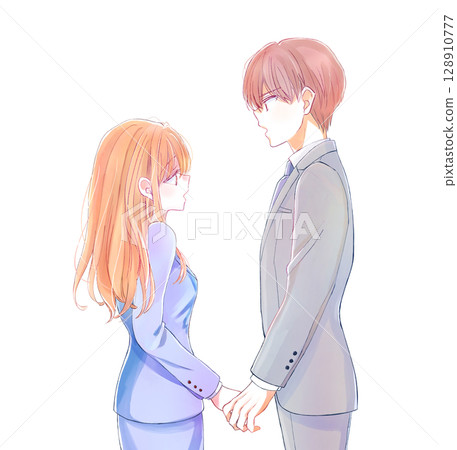 男女商人面對面，表情嚴肅，手牽手 128910777