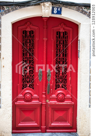 Ornate Red Doorway in Portugal 128912003