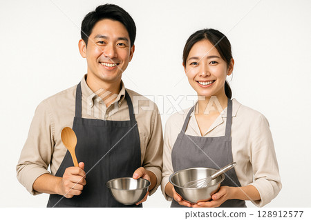 Cooking class instructors and kitchen utensils 128912577