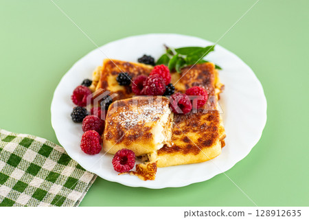 Closeup of rustic pancakes with golden crust Closeup of rustic pancakes with golden crust 128912635
