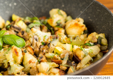 Homemade fried cauliflower with greens 128912685