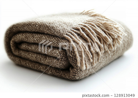 Alpaca wool throw blanket on a white background. For minimalist luxury living room. 128913049