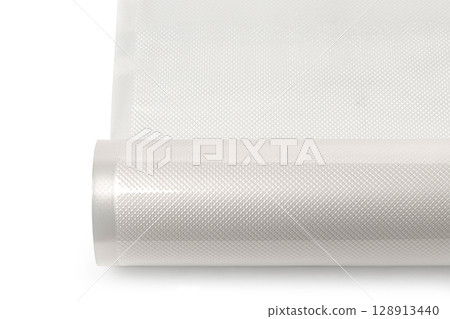 Roll of vacuum sealer bags embossed for food preservation on white background 128913440