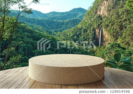 Minimalist summer travel setting with a circular podium and lush rainforest backdrop 128914598