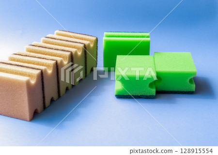 dish sponges placed on a blue background. 128915554