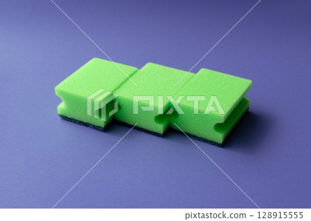 dish sponges placed on a pink background.cleaning, natural, eco, household, 128915555