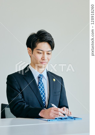 young lawyer receiving legal advice young lawyer receiving legal advice 128918260