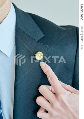 Lawyer pointing at lawyer badge 128918264