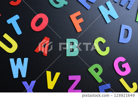 colorful letter alphabet on black background, object for education colorful letter alphabet on black background, object for education 128921649