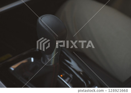interior view of car with black leather, closeup car gear control 128921668
